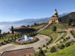 Giant Buddha statue with scenic mountain view in Sikkim